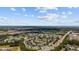 Expansive aerial view of a residential community featuring well-maintained homes, ponds, and lush green spaces at 807 Wilshire Ln. # 807, Murrells Inlet, SC 29576
