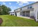 Spacious backyard featuring a well-maintained lawn, fence, and outdoor living space at 807 Wilshire Ln. # 807, Murrells Inlet, SC 29576