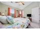 Bedroom with floral bedspread, neutral carpet, and light green walls at 807 Wilshire Ln. # 807, Murrells Inlet, SC 29576