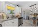 Bright kitchen with white cabinets, stainless steel appliances, and an open design at 807 Wilshire Ln. # 807, Murrells Inlet, SC 29576