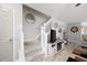 Modern living room featuring a staircase, neutral walls, and stylish decor at 807 Wilshire Ln. # 807, Murrells Inlet, SC 29576