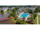 Aerial view of a community pool featuring lounge chairs and lush landscaping at 807 Wilshire Ln. # 807, Murrells Inlet, SC 29576
