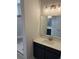 Elegant bathroom with modern vanity, stylish lighting, and walk-in shower at 901 Inlet Keys St., Murrells Inlet, SC 29576