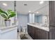 Modern bathroom featuring double sinks, granite countertops, and a separate shower at 9650 Shore Dr. # 507, Myrtle Beach, SC 29572