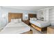 Comfortable bedroom featuring two beds with decorative headboards and ample storage at 9650 Shore Dr. # 507, Myrtle Beach, SC 29572