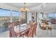 Elegant dining area with seating for six and balcony access with city views at 9650 Shore Dr. # 507, Myrtle Beach, SC 29572