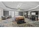 Spacious game room featuring a pool table, bar seating, and cozy armchairs at 9650 Shore Dr. # 507, Myrtle Beach, SC 29572
