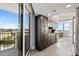 Modern kitchen featuring sleek cabinetry, stainless steel appliances, and balcony access at 9650 Shore Dr. # 507, Myrtle Beach, SC 29572