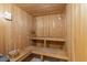 Relaxing wood paneled sauna with tiered seating, perfect for unwinding after a workout at 9650 Shore Dr. # 507, Myrtle Beach, SC 29572