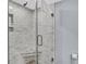Marble tiled shower with glass doors at 9650 Shore Dr. # 507, Myrtle Beach, SC 29572