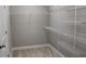 Walk-in closet featuring built-in shelving and ample storage space at Tbd 222 Persimmon Rd., Aynor, SC 29511