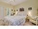 Comfortable bedroom with desk, accent chair, and queen-sized bed at 1058 Sea Mountain Hwy. # 10-101, North Myrtle Beach, SC 29582