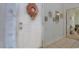 Bright entryway with a wreath-adorned door leading into a home with tile flooring at 1058 Sea Mountain Hwy. # 10-101, North Myrtle Beach, SC 29582