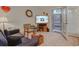 Comfortable living room with cozy furnishings and a view to the outdoor patio at 1058 Sea Mountain Hwy. # 10-101, North Myrtle Beach, SC 29582