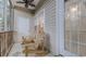 Inviting screened porch featuring tile floors and comfortable rocking chairs at 1058 Sea Mountain Hwy. # 10-101, North Myrtle Beach, SC 29582