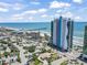 Breathtaking aerial view of the Oceans One resort building next to a fishing pier along the beach at 107 S Ocean Blvd. # 503, Myrtle Beach, SC 29577