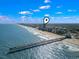 Aerial view of the coast with a pinpoint over a condominium on the beach at 107 S Ocean Blvd. # 503, Myrtle Beach, SC 29577