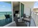 Relaxing balcony with outdoor seating and stunning ocean views, perfect for enjoying the sea breeze at 107 S Ocean Blvd. # 503, Myrtle Beach, SC 29577