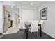 Dining area with seating for four with views of the kitchen area at 107 S Ocean Blvd. # 503, Myrtle Beach, SC 29577