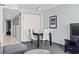 Cozy dining area with seating for four, adjacent to the living area and hallway at 107 S Ocean Blvd. # 503, Myrtle Beach, SC 29577