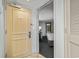 Entryway with a door leading into a hotel room featuring two beds, a nightstand, and carpet at 107 S Ocean Blvd. # 503, Myrtle Beach, SC 29577