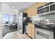 Efficient kitchen with appliances and a view of the ocean at 107 S Ocean Blvd. # 503, Myrtle Beach, SC 29577