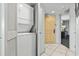 In unit laundry area with stacked washer and dryer at 107 S Ocean Blvd. # 503, Myrtle Beach, SC 29577