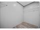 Walk-in closet featuring wire shelving and wood-look flooring at 108 Forman Way, Aynor, SC 29511