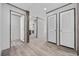 Hallway featuring wood-look flooring and entrances to rooms in the home at 108 Forman Way, Aynor, SC 29511