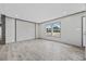 Bright, open living space features wood-look floors, neutral paint, and recessed lighting at 108 Forman Way, Aynor, SC 29511