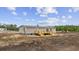 Rear view of home with spacious lot and wooden deck, showing expansive view of surrounding new construction area at 108 Forman Way, Aynor, SC 29511