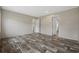 A bedroom features neutral-colored walls and wood-look floors, plus doors to other rooms at 109 Forman Way, Aynor, SC 29511