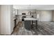Spacious kitchen with modern stainless appliances and an island with pendant lights at 109 Forman Way, Aynor, SC 29511