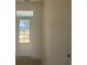 Entryway with natural light and a view of the neighborhood through the front door at 119 Westfield Circle, Conway, SC 29526