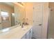 Bathroom featuring a vanity with a white countertop, mirror, and walk in shower at 123 Retreat Pl., Little River, SC 29566