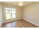 Cozy bedroom with natural light and wood floors, offering a comfortable and inviting atmosphere at 123 Retreat Pl., Little River, SC 29566