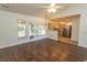 Open-concept living room featuring hardwood floors at 123 Retreat Pl., Little River, SC 29566