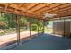 Spacious screened patio with ceiling fan overlooking a brick patio and landscaped backyard at 123 Retreat Pl., Little River, SC 29566