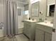Bright bathroom features double vanity sinks, tub, and shower, providing ample space and comfort at 1307 Carolina Wren Ln., Murrells Inlet, SC 29576