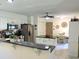 Modern kitchen with stainless steel appliances, granite countertops, and a breakfast bar at 1307 Carolina Wren Ln., Murrells Inlet, SC 29576