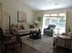 Comfortable living room with ample seating, soft lighting, and a cozy atmosphere at 1307 Carolina Wren Ln., Murrells Inlet, SC 29576