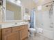 Well-lit bathroom features a vanity, toilet, and shower-tub combination at 139 Avian Dr. # 6-201, Pawleys Island, SC 29585