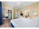 Cozy bedroom features wood floors and a view into the ensuite bathroom at 139 Avian Dr. # 6-201, Pawleys Island, SC 29585