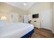 Spacious bedroom with ensuite bathroom and view to the dining room at 139 Avian Dr. # 6-201, Pawleys Island, SC 29585
