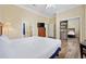 Well-lit bedroom with access to an ensuite bathroom and closet at 139 Avian Dr. # 6-201, Pawleys Island, SC 29585