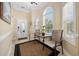 Welcoming foyer with decorative rug, comfortable seating, and natural light at 139 Avian Dr. # 6-201, Pawleys Island, SC 29585