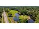 Scenic aerial of the beautiful golf course and pond with a picturesque view of the green at 139 Avian Dr. # 6-201, Pawleys Island, SC 29585