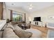 Inviting living room with a plush sectional sofa and a vaulted ceiling at 139 Avian Dr. # 6-201, Pawleys Island, SC 29585