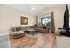 Comfortable living room featuring a large sectional sofa and sliding glass doors at 139 Avian Dr. # 6-201, Pawleys Island, SC 29585
