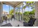 Relaxing screened porch provides a serene outdoor space with views of the surroundings at 139 Avian Dr. # 6-201, Pawleys Island, SC 29585